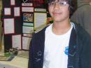 Figure 3  Frankie Moirao, KI6QYS, took second place in the Mathematics and Computer Science
category of the Junior division. He designed a wireless digital data  communications
system used to remotely control a robot.
